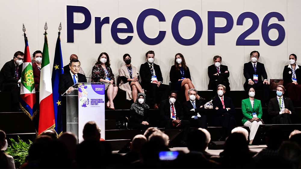 Italian Prime Minister Mario Draghi speaks at a pre-COP summit in Milan